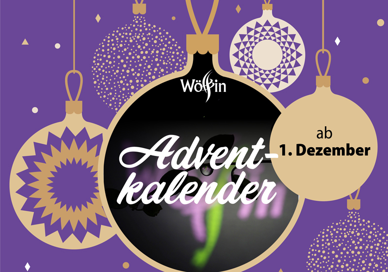 Illustration Weihnachtskugeln mit Logo Wölfin und Schriftzug Adventkalender